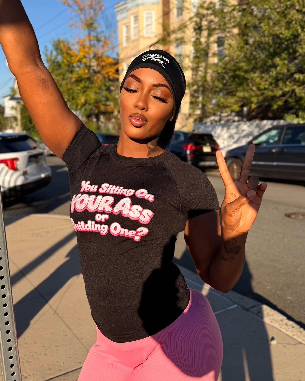 The You Sitting On Your Ass or Building One tee with a Shimmer and Flex headband